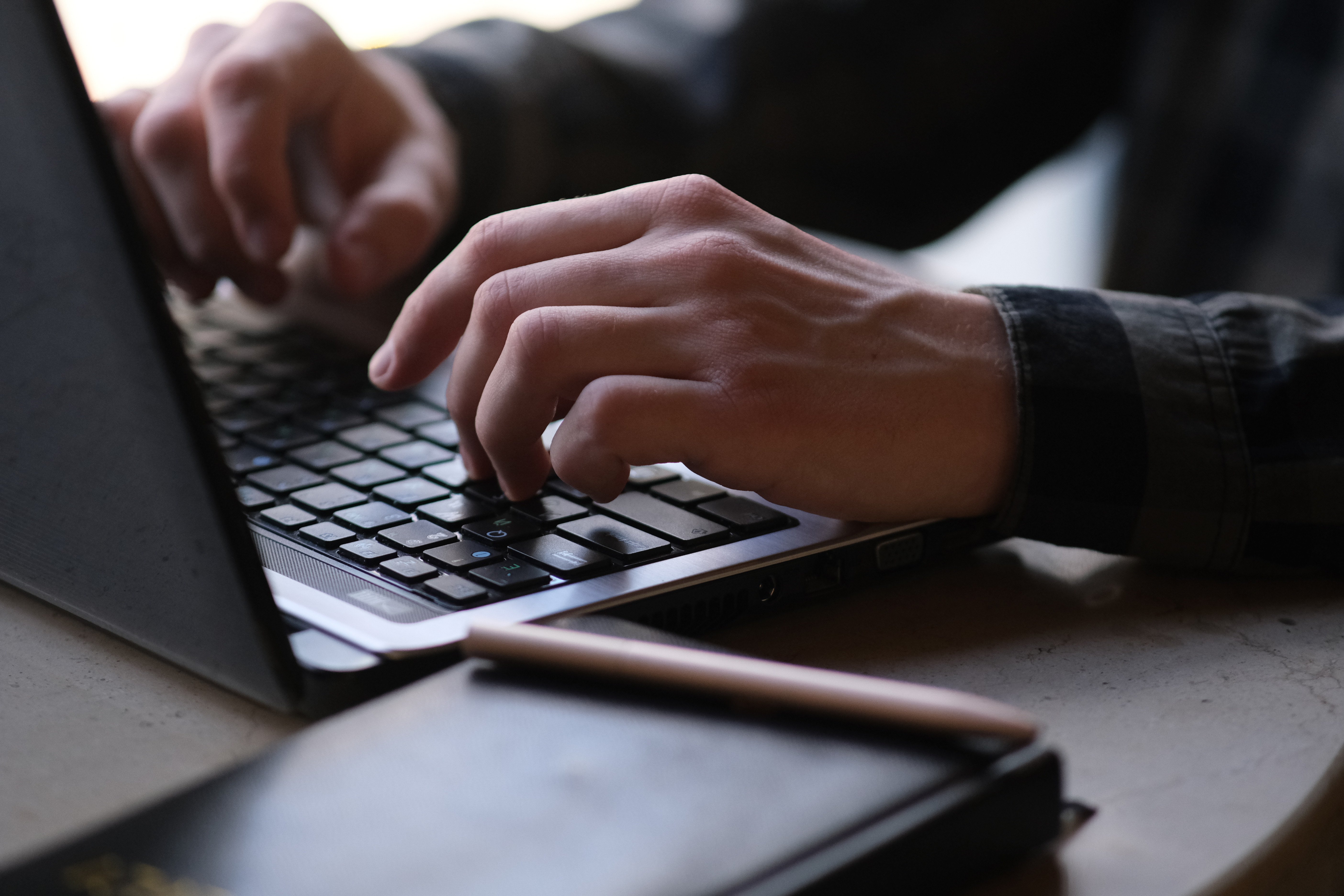 Person Using Black Laptop Computer